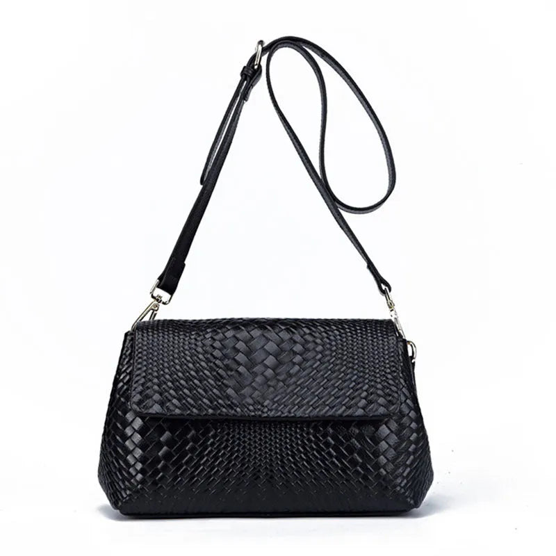 Black genuine leather woven crossbody bag with embossed finish, soft carry handle, and single shoulder strap.