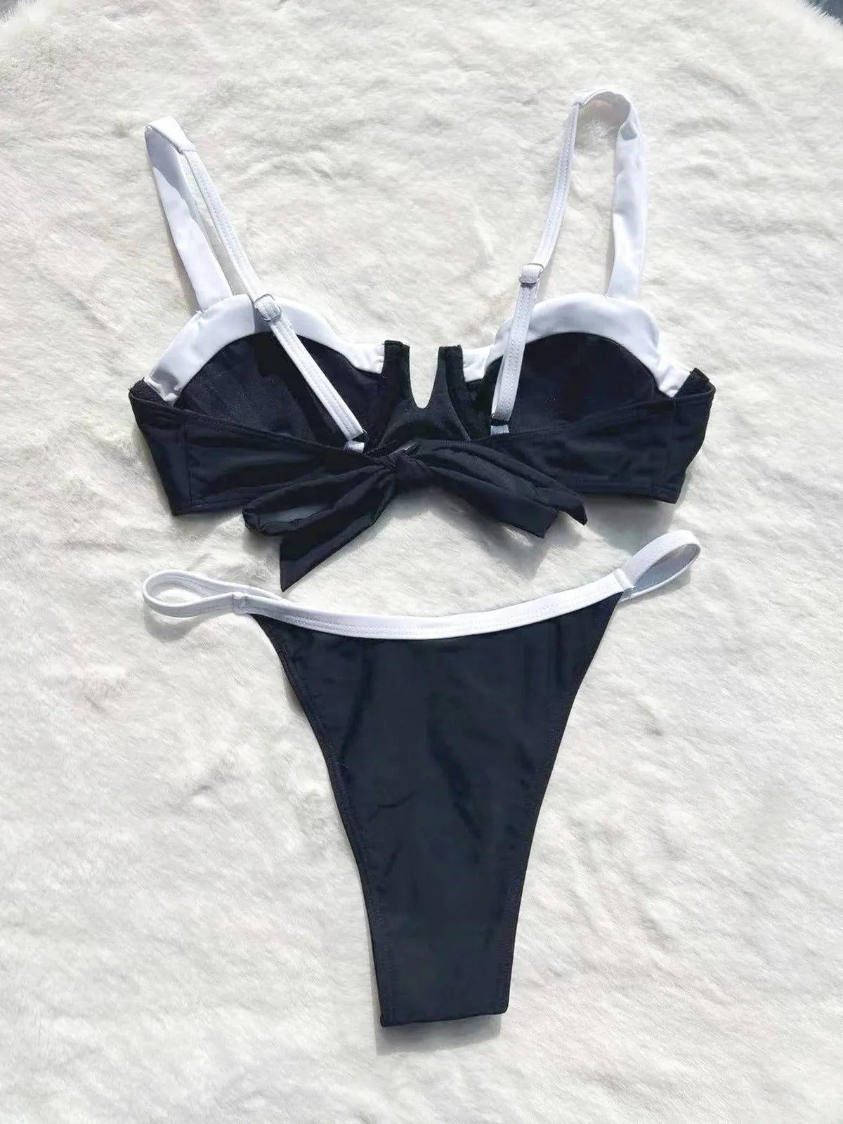 Black low waist bikini swimsuit with stitching split detail and briefs style cut