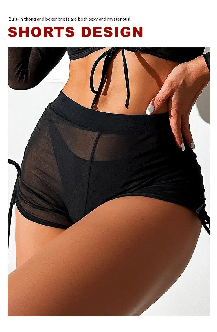 Women's black mesh four-piece bikini set with long sleeve crop top and high-waisted briefs