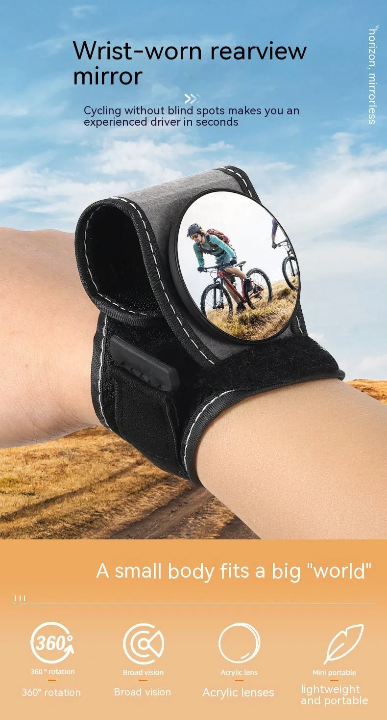 Black nylon wrist-mounted bicycle rear-view mirror with velcro strap and armoured glass reflective surface.