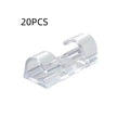 Transparent plastic self-adhesive cable management snap clips in a pack of 20.