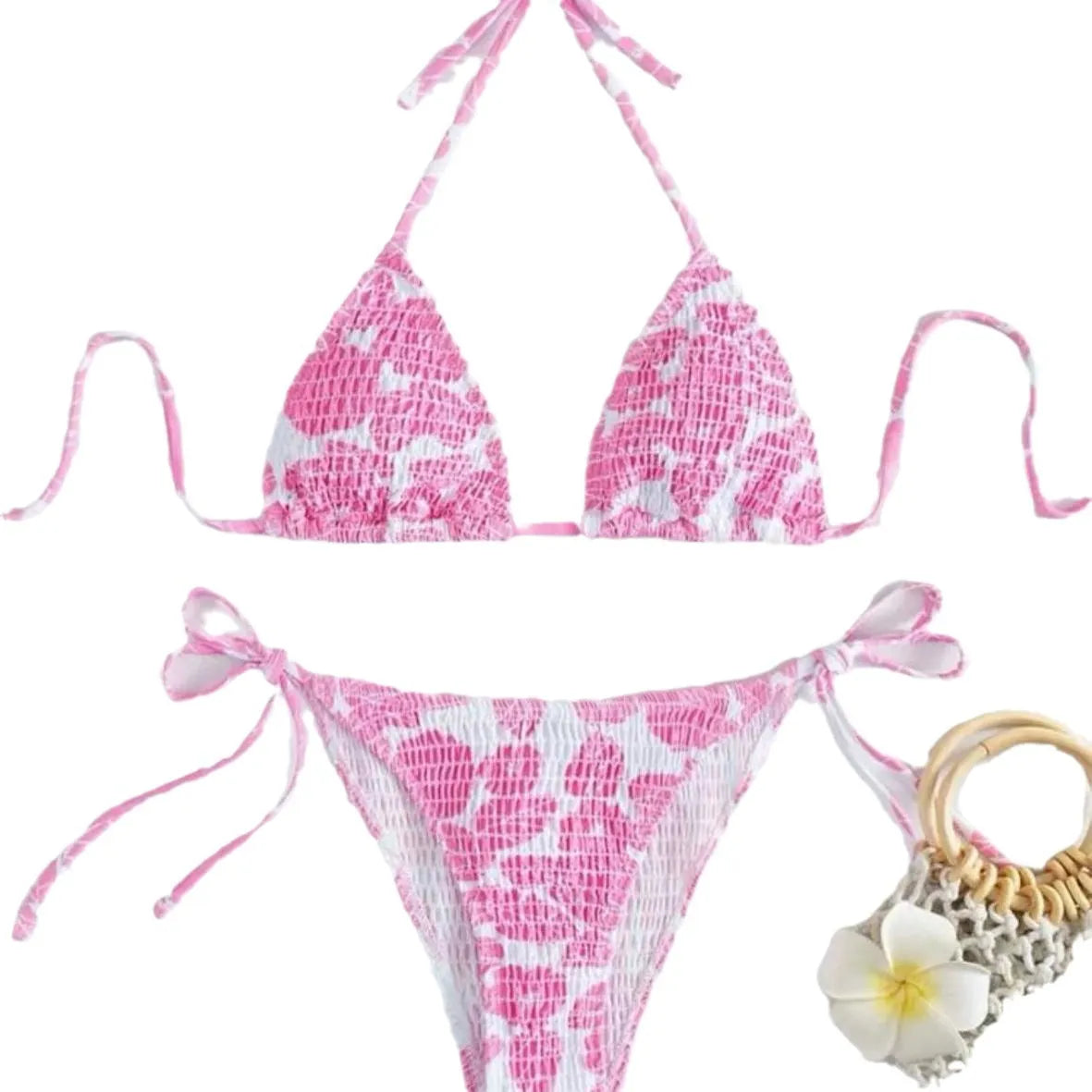 Women's pink floral halter neck bikini swimsuit with briefs on a mannequin.