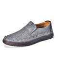 Men's brown casual slip-on leather shoes with round toe and flat sole on a white background.
