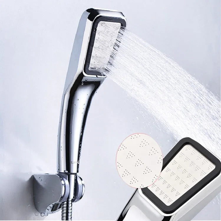 Hand-held pressurised shower with rainfall function and orange shower head option