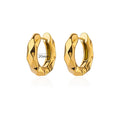 A pair of women's geometric butterfly earrings made from copper with heart, bow, and star shapes in a gold colour finish.