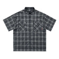 Men's black and brown plaid shirt with embroidered letter detail and lapel collar