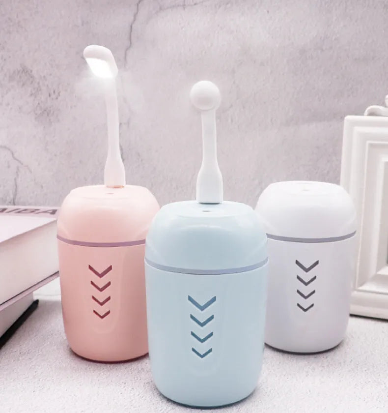 X3 portable car humidifier with columnar design in blue, pink and white colour options