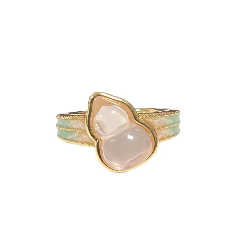 Adjustable copper ring featuring a gourd, flower, and bow design with zircon inlay in New Chinese style.