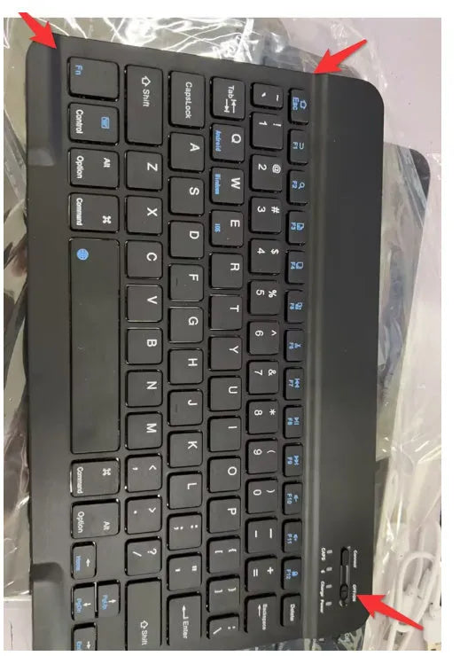 Mini Bluetooth wireless keyboard in black or white with 10-inch size option showing compact design