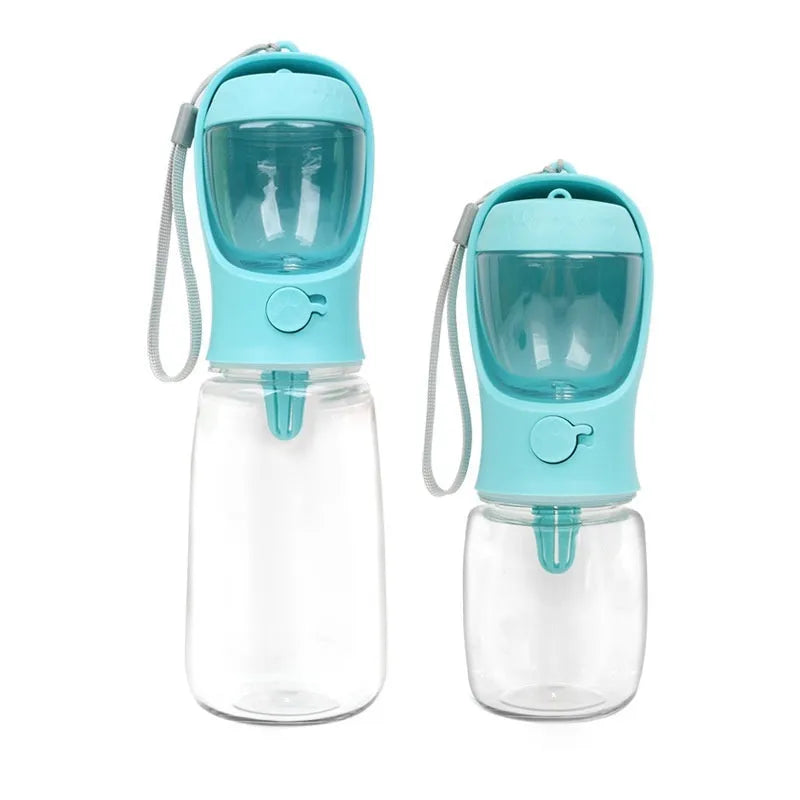 Blue portable plastic dog water bottle with integrated drinking trough for outings.