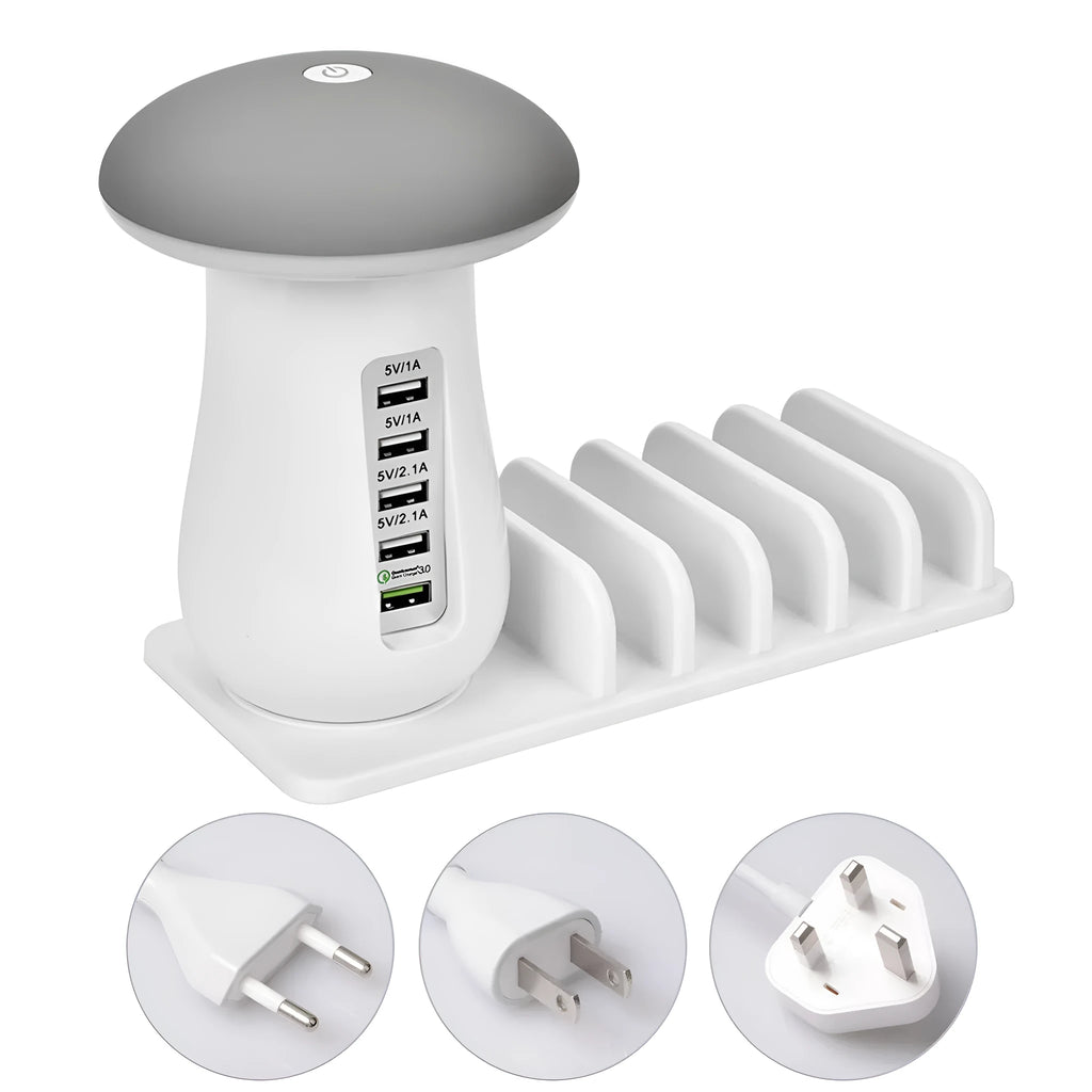 White USB charging station with five ports and built-in LED night light on wooden desk