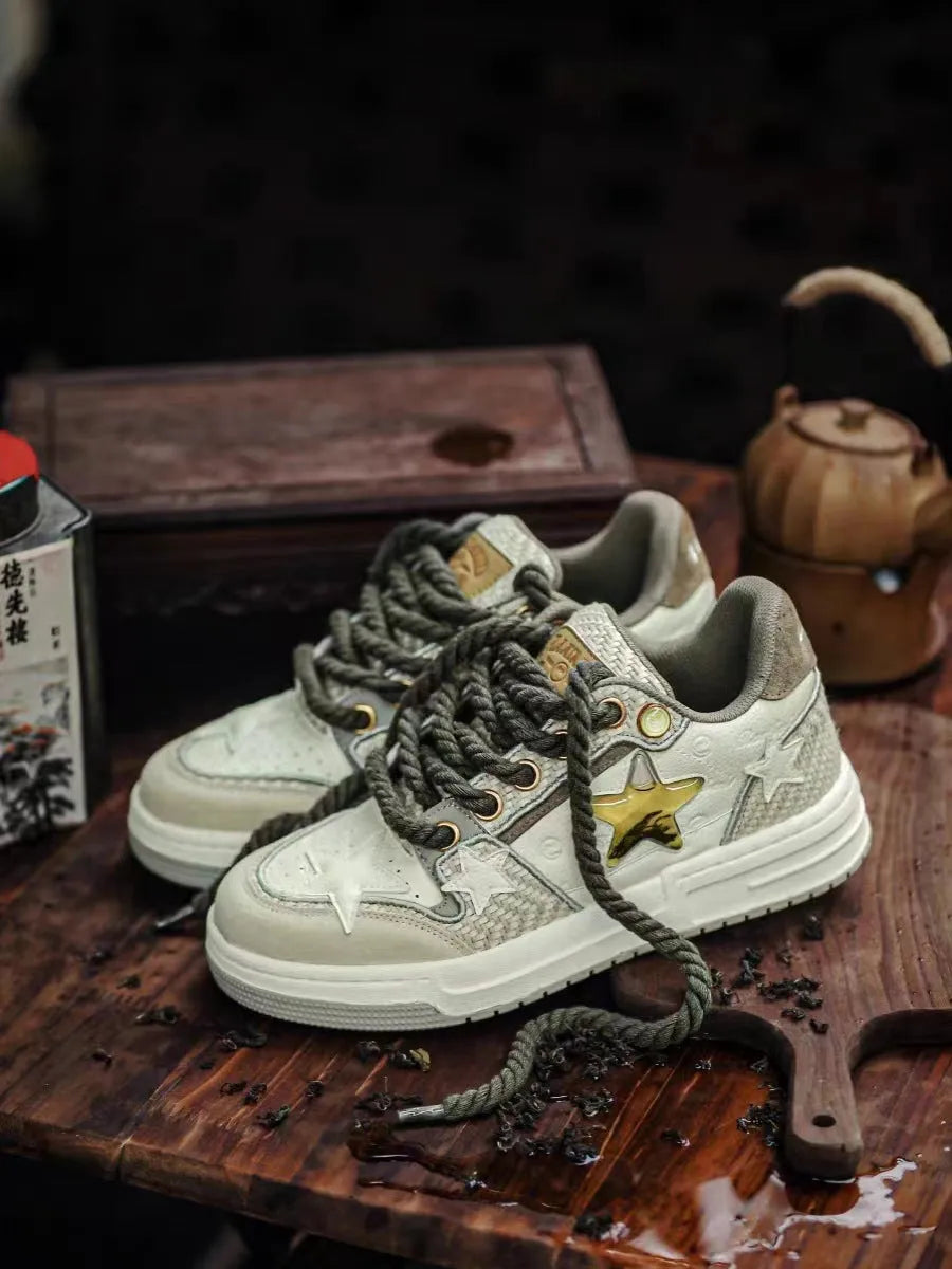 Brown leather platform running shoes with round toe and lace-up closure on white background