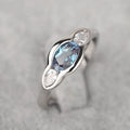 Women's geometric ellipse ring in white gold finish with inlaid zircon stones on copper