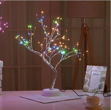 LED Christmas tree light with 108 LEDs on 50-60cm tall plastic tree structure and touch-sensitive base