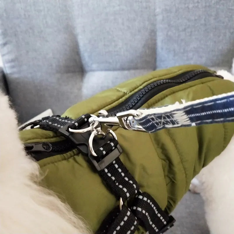 Red waterproof dog coat with integrated harness for winter outdoor use