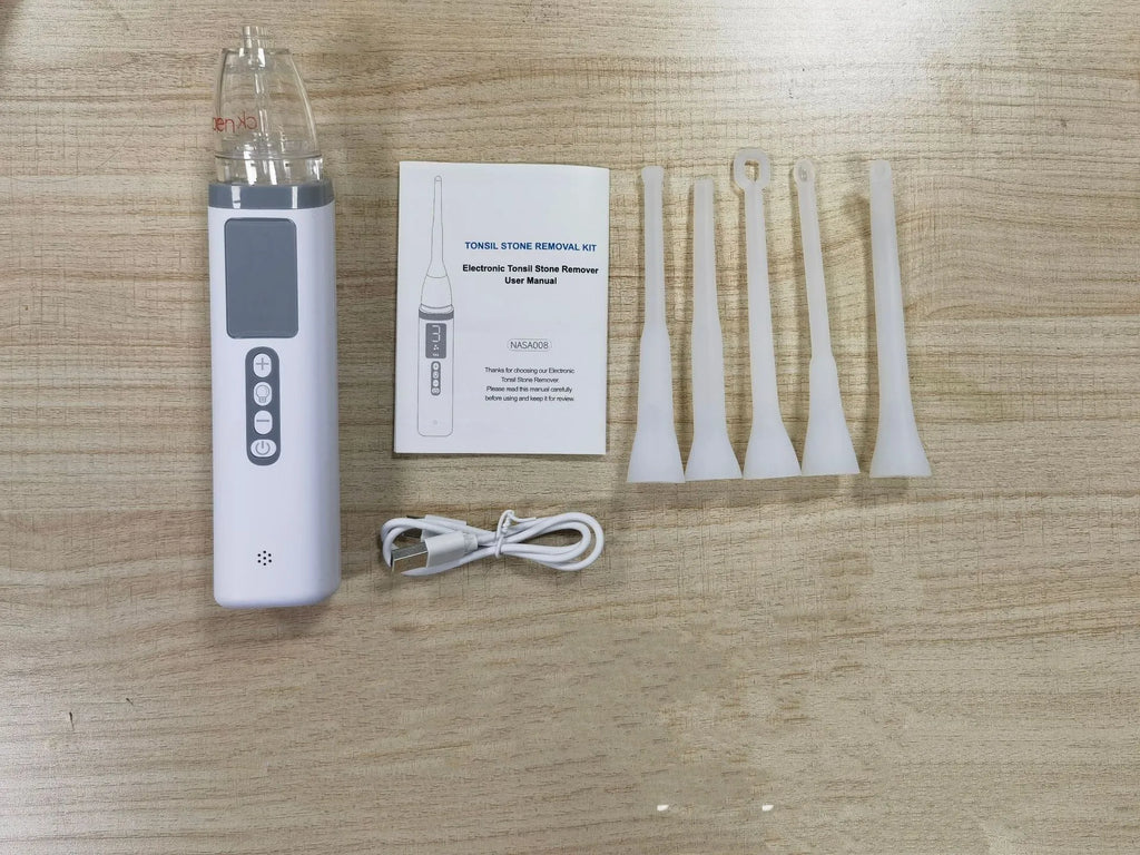 Milky white tonsil stone removal tool kit for oral hygiene, extractor tool on a plain background.