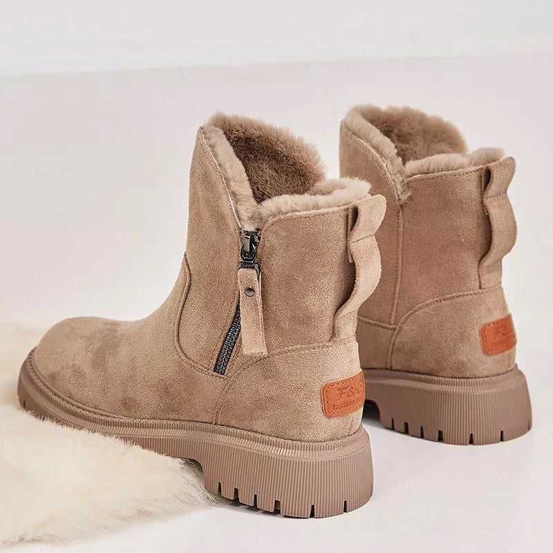 Women's black high-top plush snow boots with a side zipper and thick rubber sole