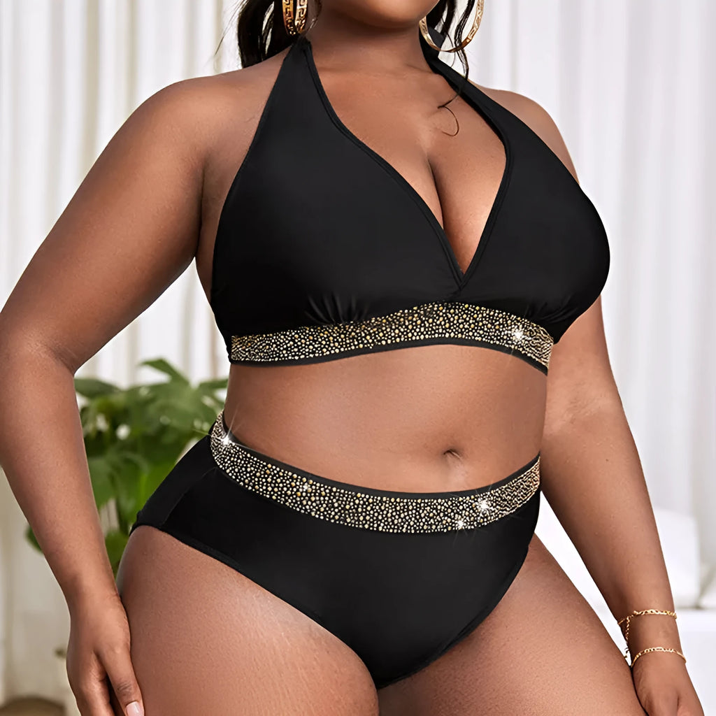 Black plus size women's bikini swimsuit showing bra and shorts two-piece design