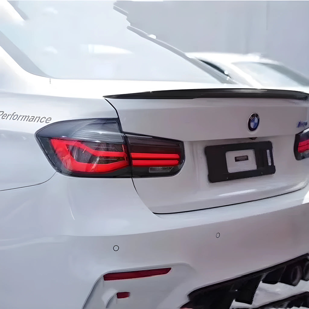 BMW 3 Series tail light assembly with LED running lights in red or smoked black options