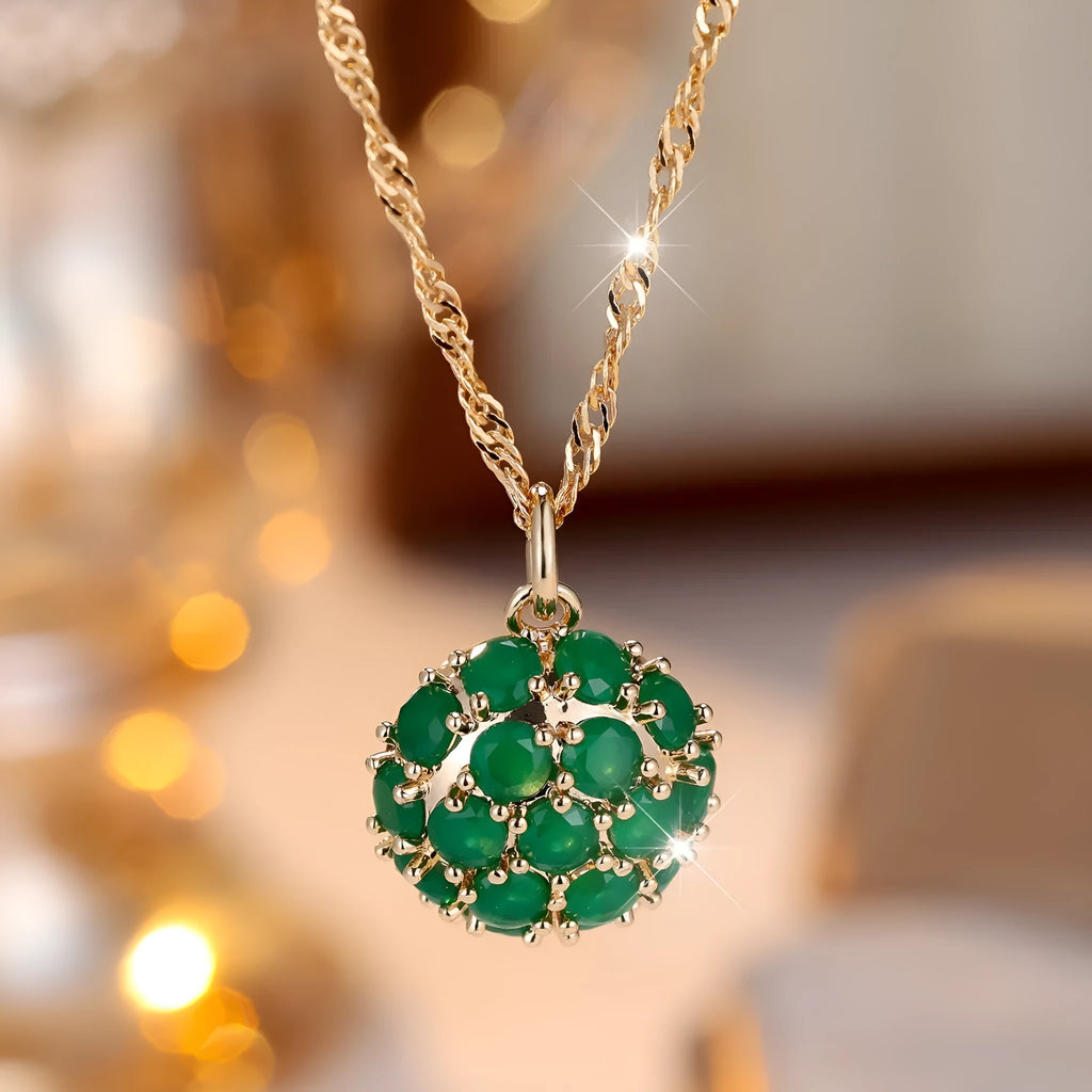 Round geometric emerald diamond necklace with champagne gold finish and adjustable chain