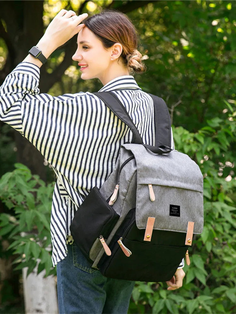 LAND Mommy MPB86 large grey oxford cloth diaper backpack with shoulder straps and changing mat.