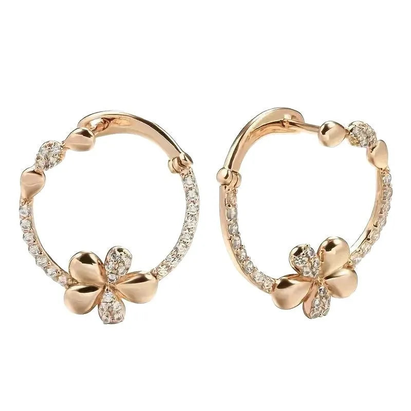 A pair of women's round silver hoop earrings made from electroplated copper.