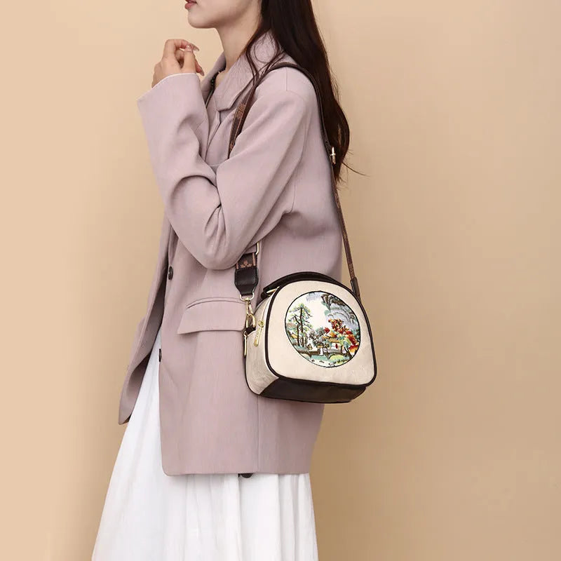 Vintage embroidered PU shoulder bag in beige or black with single strap and pillow shape