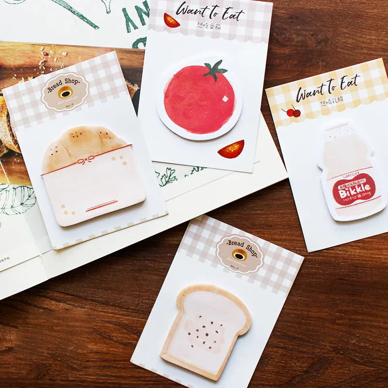 Food-shaped A5 notepad with bread, tomato, and yogurt designs, 85mm by 120mm.
