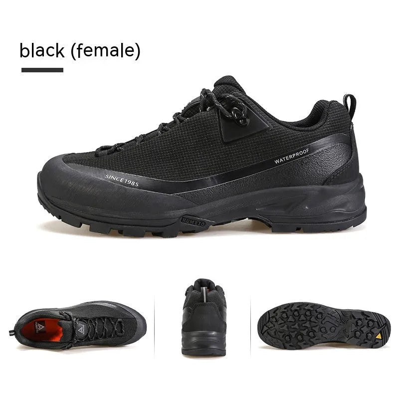 Men's low-top leather mesh hiking boots in black with non-slip rubber sole and lace-up front.