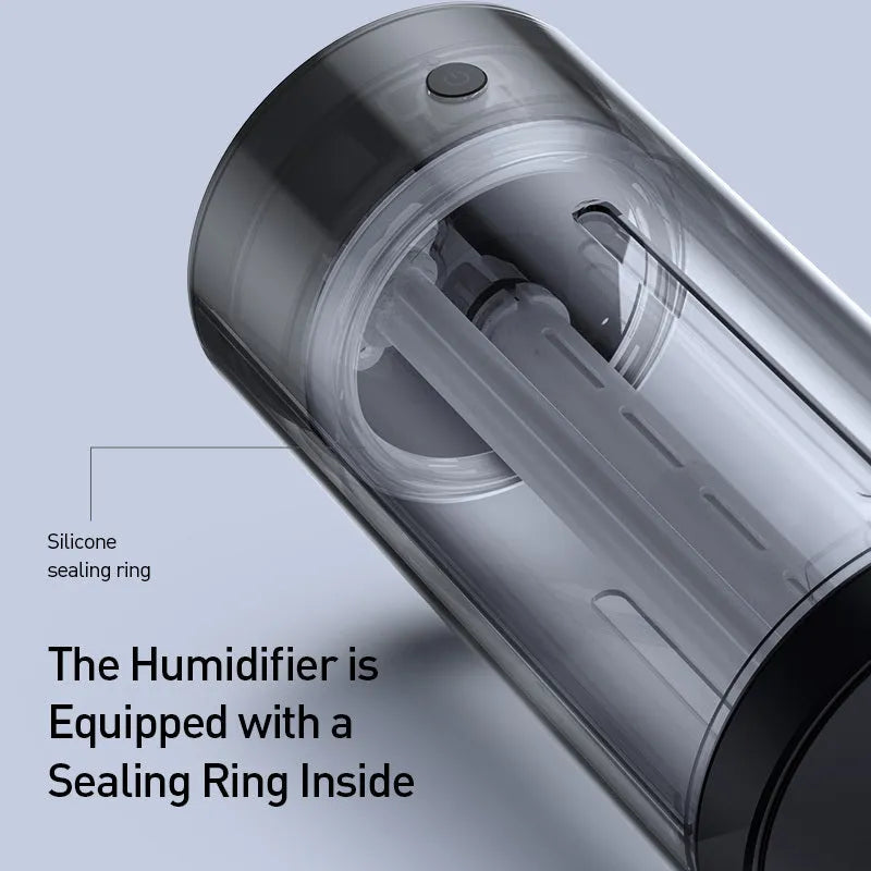 Black aluminium alloy car diffuser humidifier with USB cable on a car dashboard