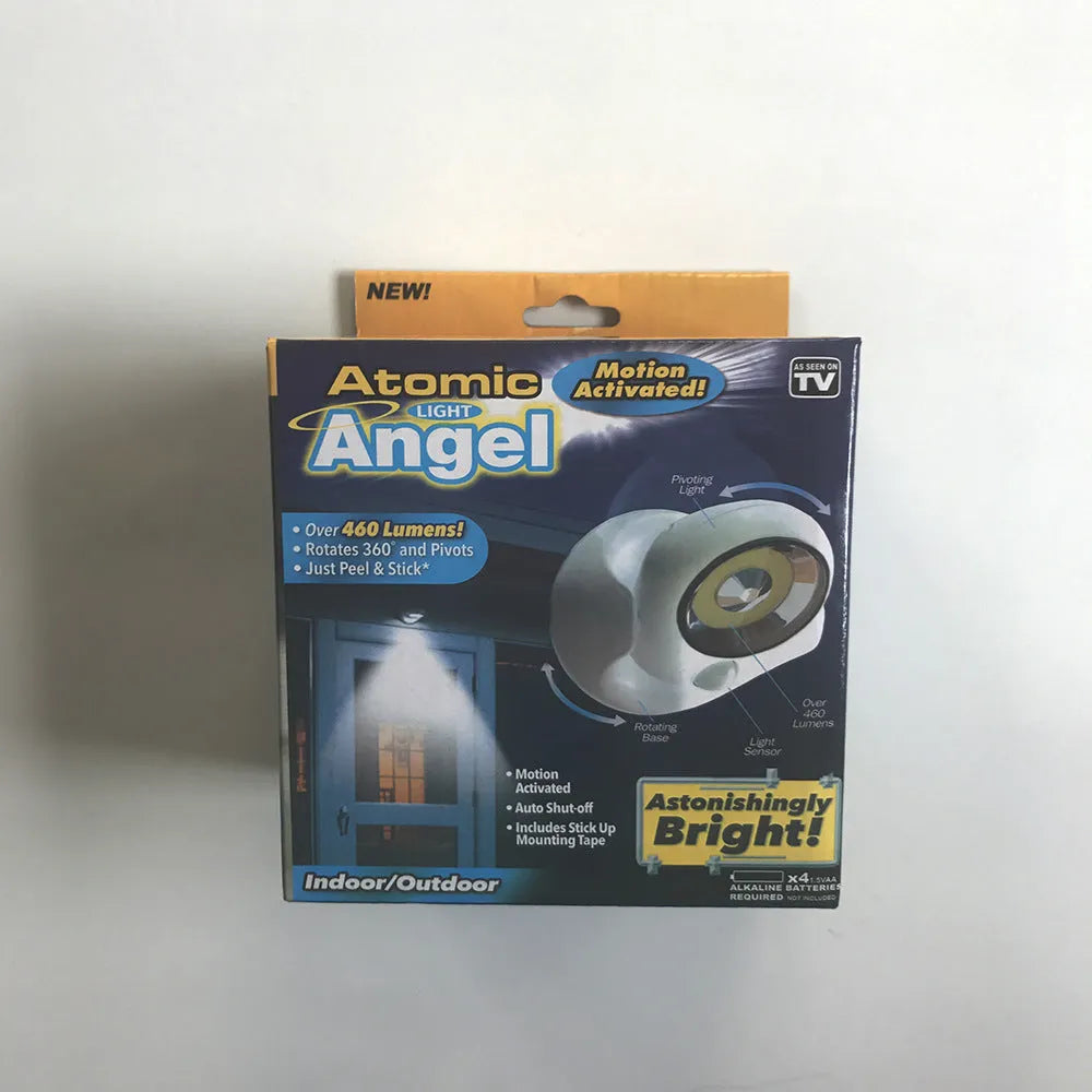 White Atomic Angel induction light unit with ABS plastic housing, showing compact size.