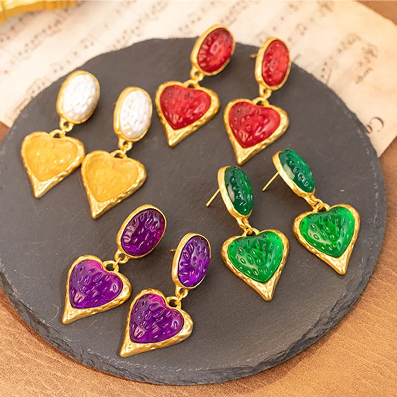 Alloy pleated oval love heart stud earrings with silver needle detailing in multiple colour options