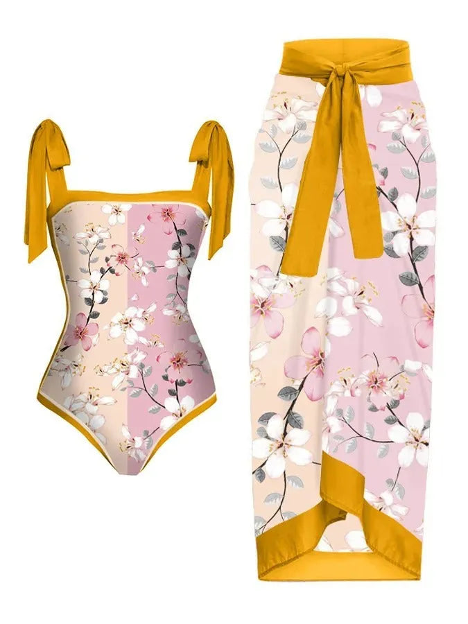 Women's printed floral two-piece swimsuit with a light chiffon hip skirt.