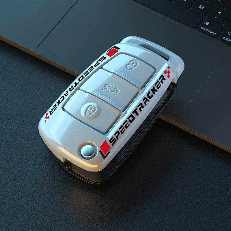 Carbon fibre style car key cover with mirror element in carbon black and white colours