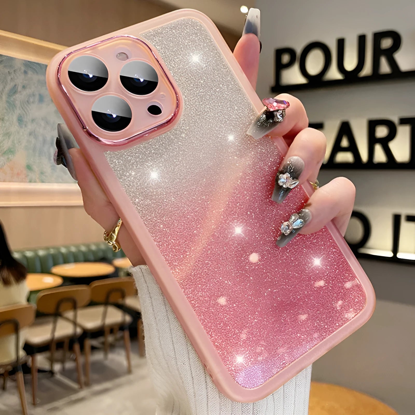 Ultra-thin glitter gradient magnetic phone case for iPhone on a table, showing silver colour shift.