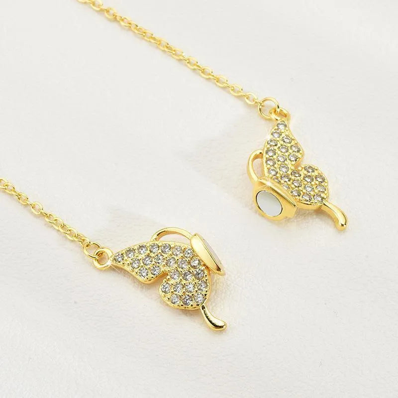 Women's magnetic fastening butterfly necklace with twisted titanium steel chain in gold colour