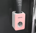White and grey wall mounted automatic toothpaste dispenser with toothbrush rack, shown in grey, green and pink colour options.