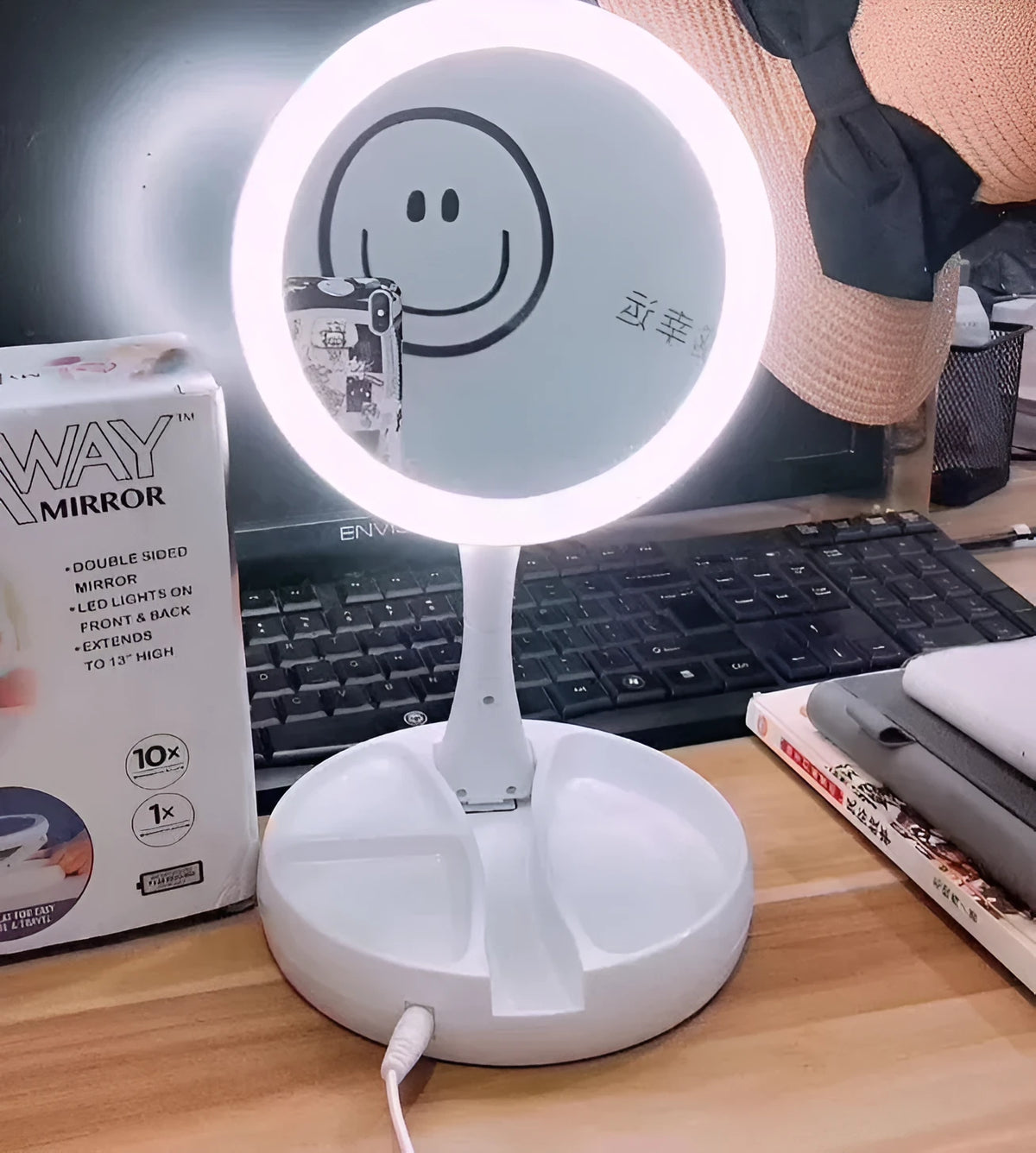 White acrylic LED vanity mirror with USB port and foldable storage compartments