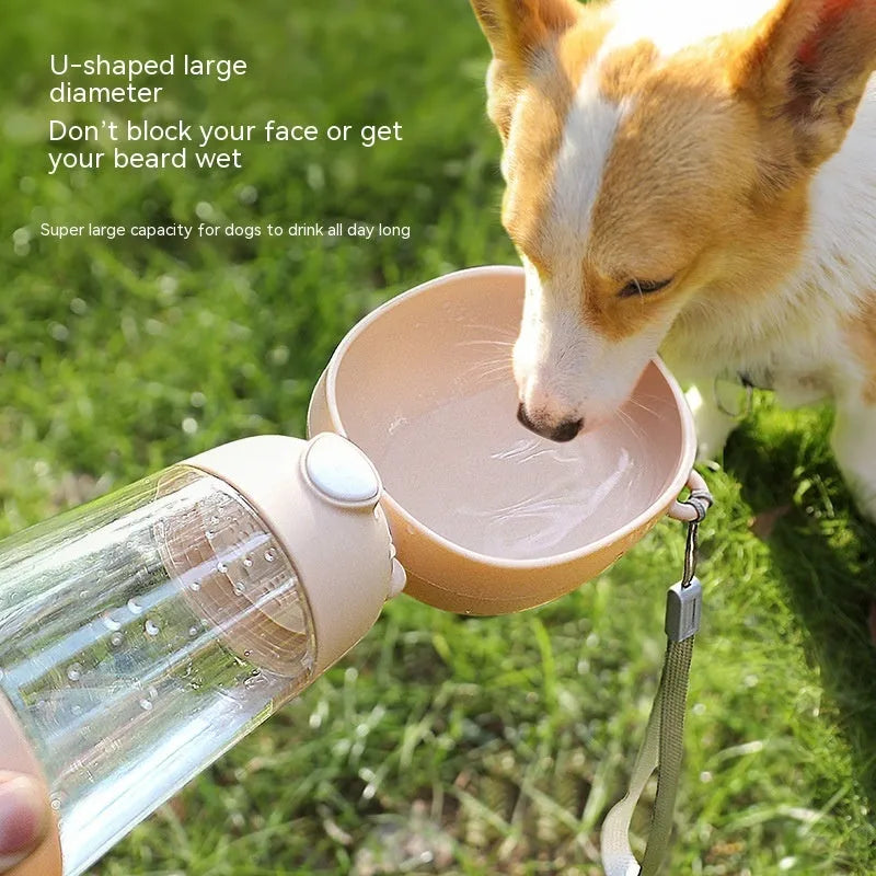 Portable dog water bottle with fold-out feeding bowl in brown colour for outdoor travel