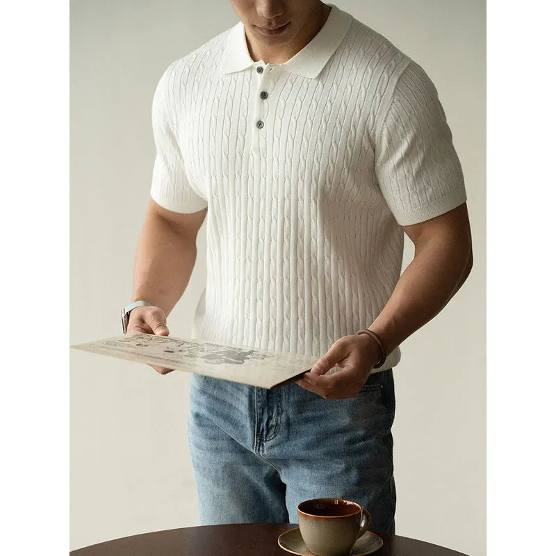 Men's khaki short sleeve business casual top on a hanger.