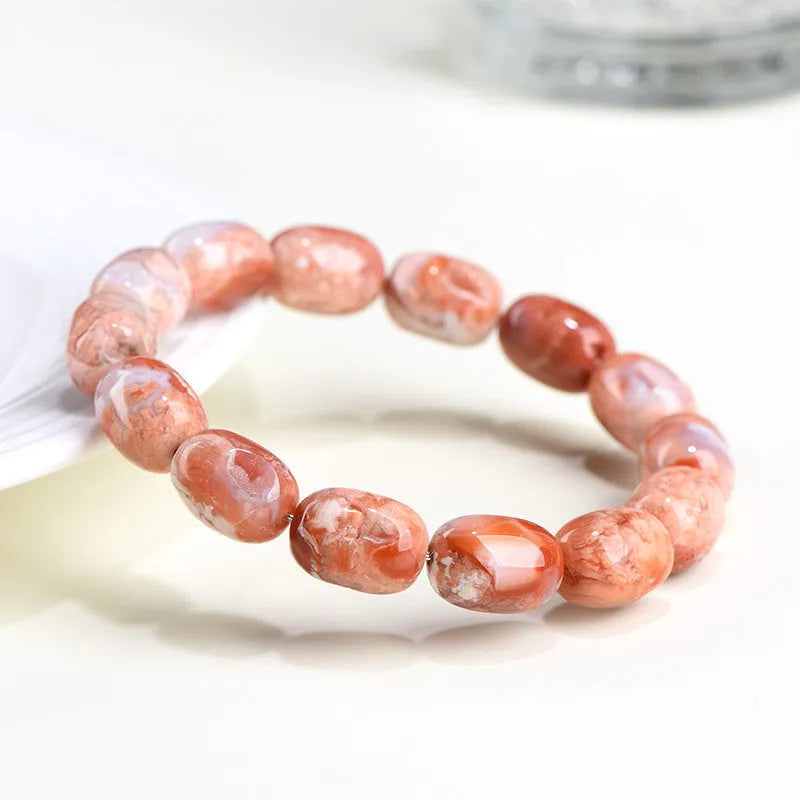 Natural cherry agate barrel bead bracelet with geometric design and ruyi elements