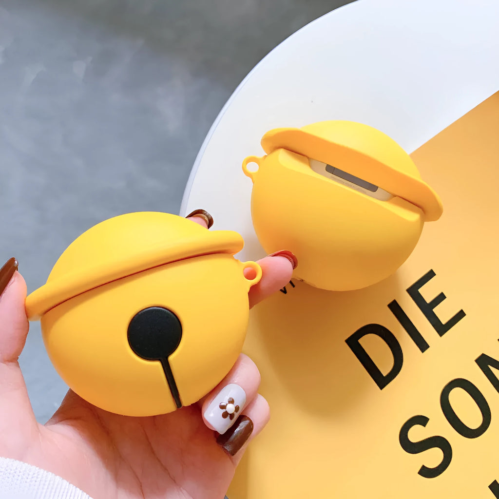 Yellow silicone case with a bell charm and keyring for Apple AirPods 1 and 2 generation.