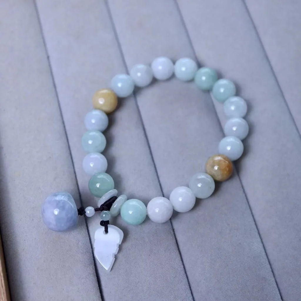 Natural emerald jade bracelet with geometric beads and Maitreya Buddha hanging pendant