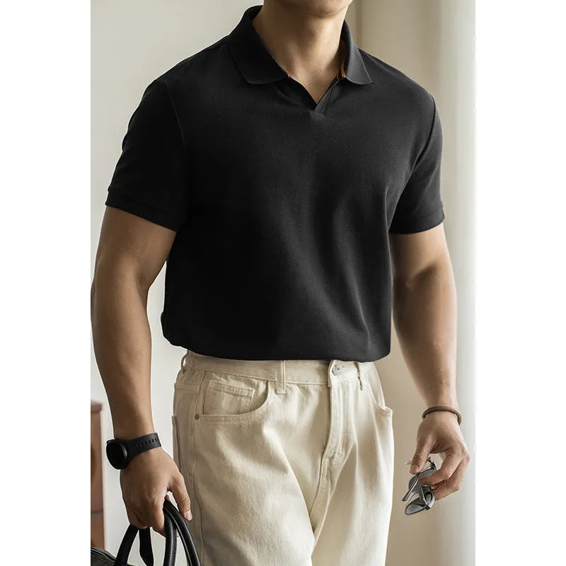 Man's American-style blue cotton blend short-sleeved polo shirt on a hanger.