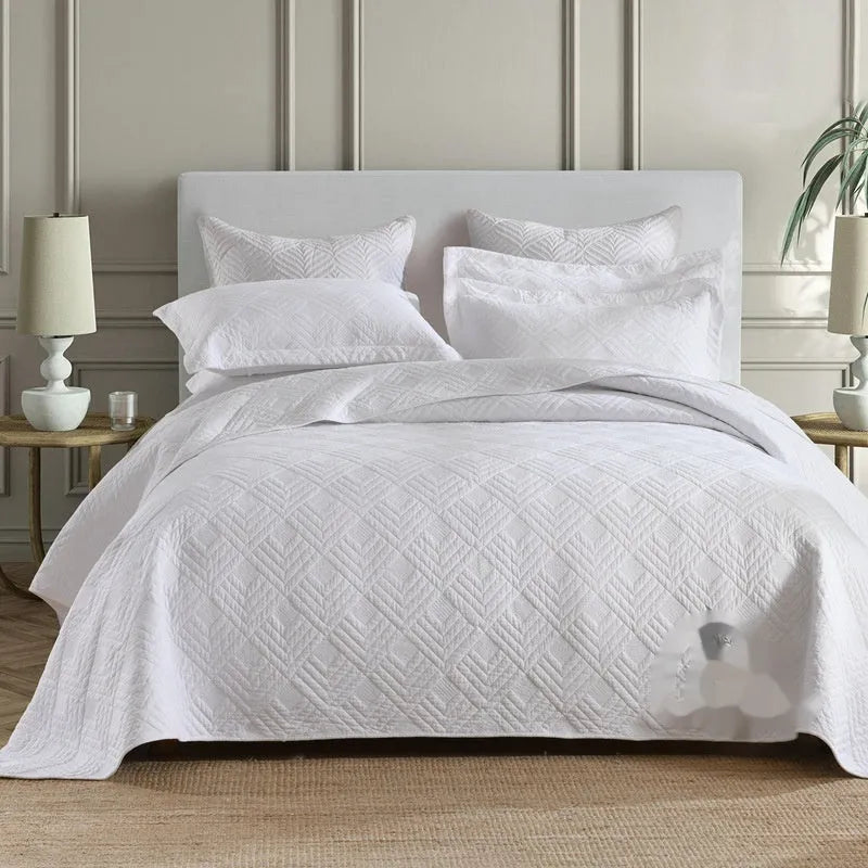 Pure cotton bedding set with damascus pattern showing embroidery details and quilted finish on bed