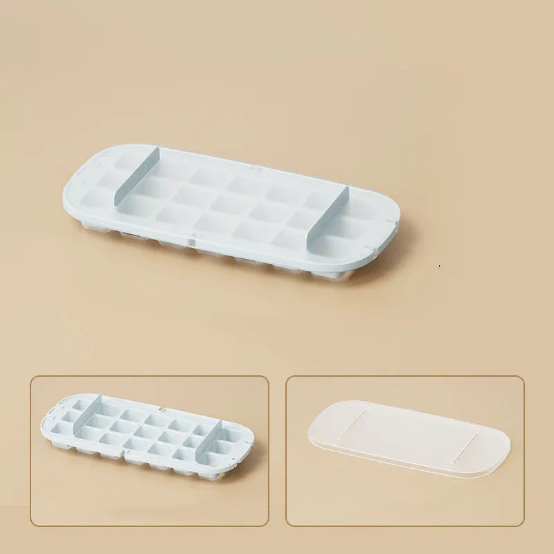 Food-grade plastic high capacity ice cube tray with grid and stored ice shovel in blue colour.