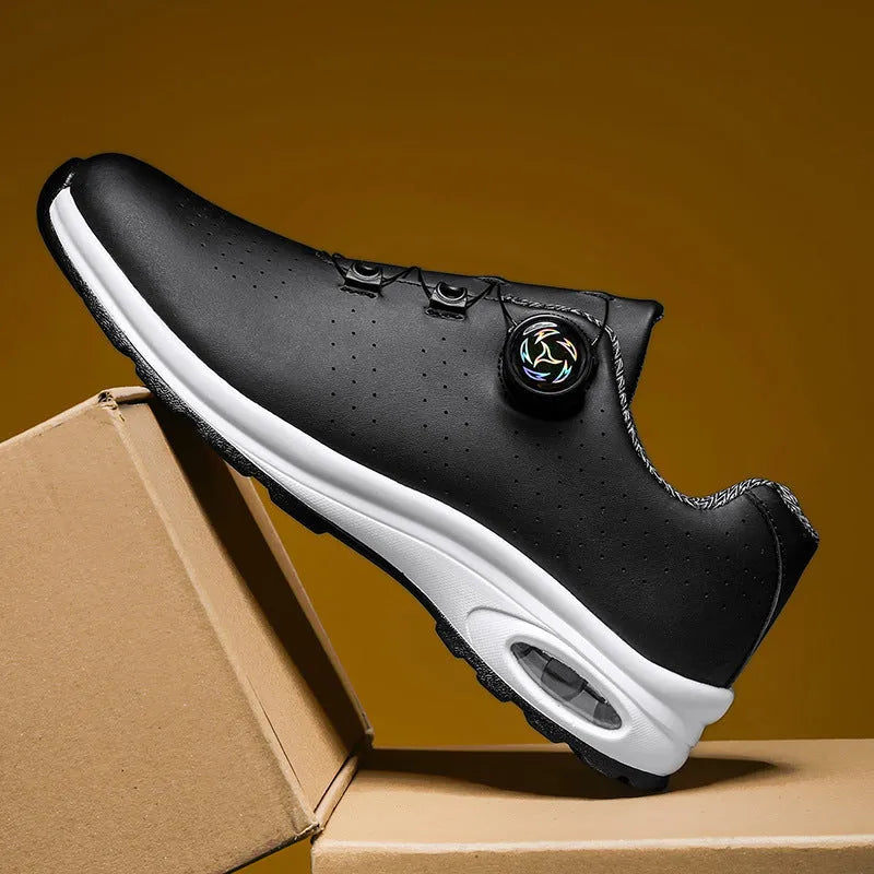 Women's black mesh low-top casual trainers with white cross-straps and a round toe, on a white background.