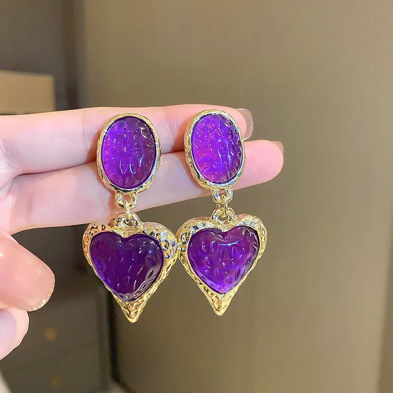 Alloy pleated oval love heart stud earrings with silver needle detailing in multiple colour options