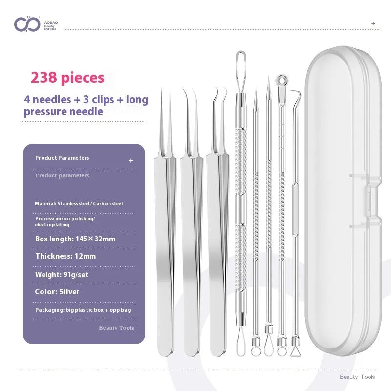 Four silver metal acne needles with fine points held together by a metal clip.