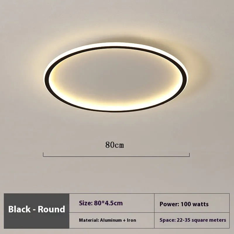 Modern minimalist black ceiling lamp with LED lights and dimming control on a bedroom ceiling.